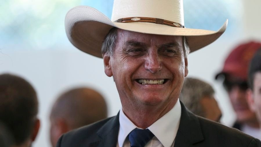 Bolsonaro com chapéu de caubói. oto: José Cruz/Agência Brasil.